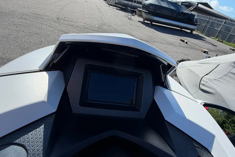 Slide: The Image of 2024 Yamaha WaveRunner GP HO dashboard with digital display in outdoor setting. - 7