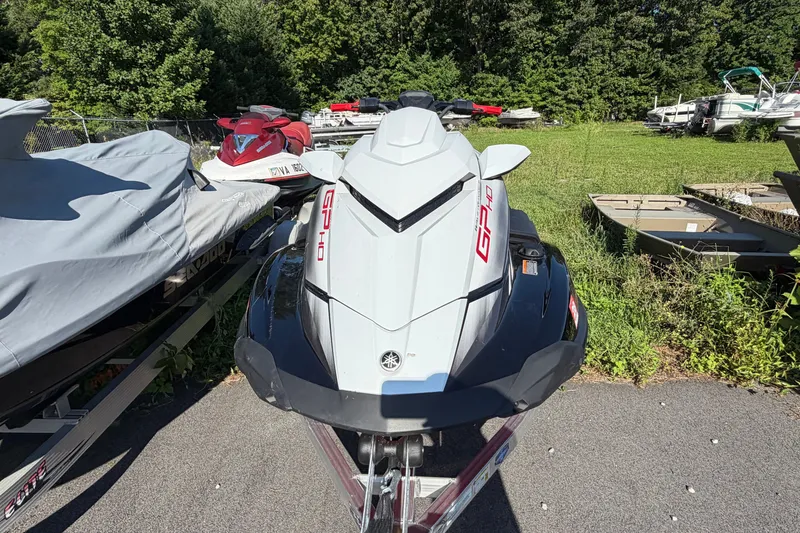 Slide: The Image of 2024 Yamaha WaveRunner GP HO jet ski parked outdoors on a sunny day. - 3