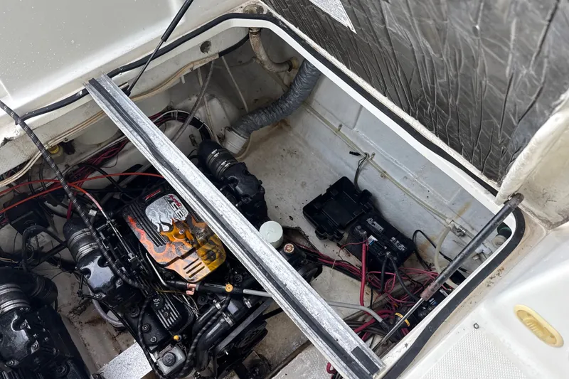 Slide: The Image of Engine compartment of a 1999 Maxum 3300 SCR boat, showing wiring and components. - 66
