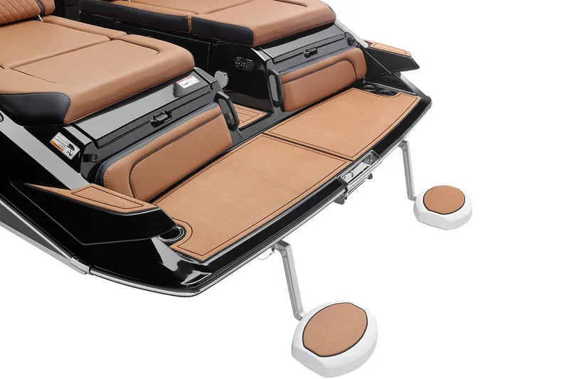 Slide: The Image of Manufacturer Provided Image: 2026 Yamaha Boats 275SD swim platform with tan seating and sleek design. - 11