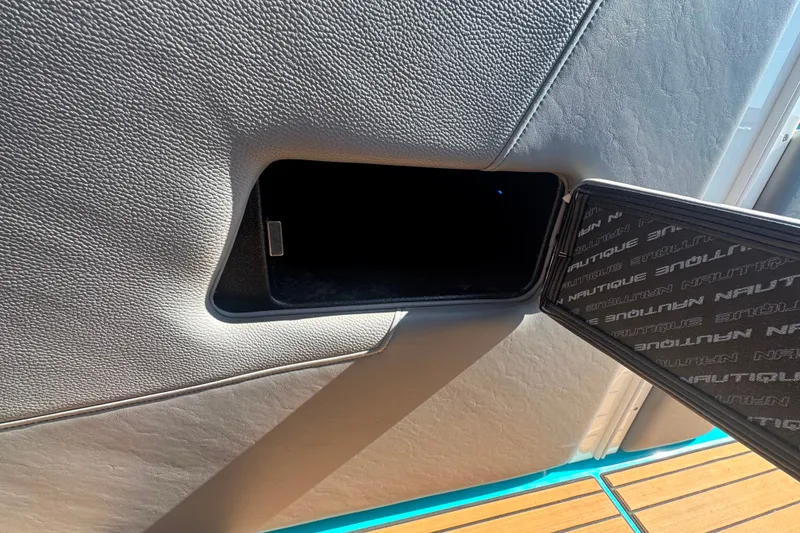 Slide: The Image of Storage compartment in 2022 Nautique Super Air Nautique G23 boat interior. - 122