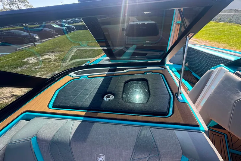 Slide: The Image of 2022 Nautique Super Air Nautique G23 interior with open hatch and modern design. - 71