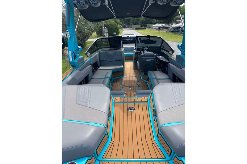 Slide: The Image of 2022 Nautique Super Air Nautique G23 interior with sleek seating and modern design. - 24