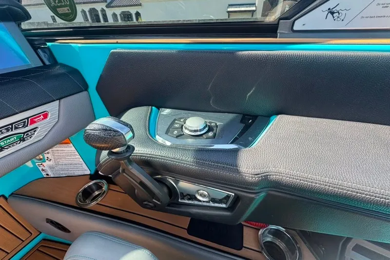 Slide: The Image of Interior controls of a 2022 Nautique Super Air Nautique G23 boat. - 48