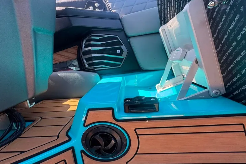 Slide: The Image of Interior of 2022 Nautique Super Air Nautique G23 with premium seating and speaker system. - 106