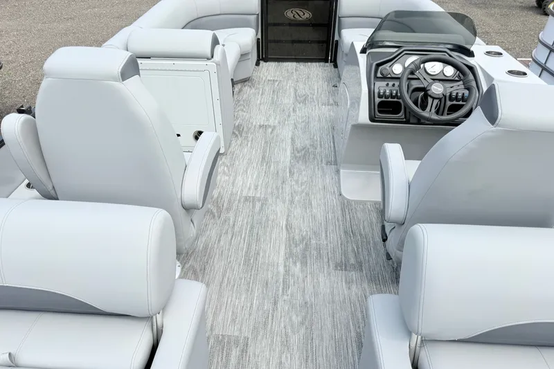 Slide: The Image of 2027 Bentley Pontoons LEGACY 220 QSB interior with modern seating and sleek dashboard design. - 21
