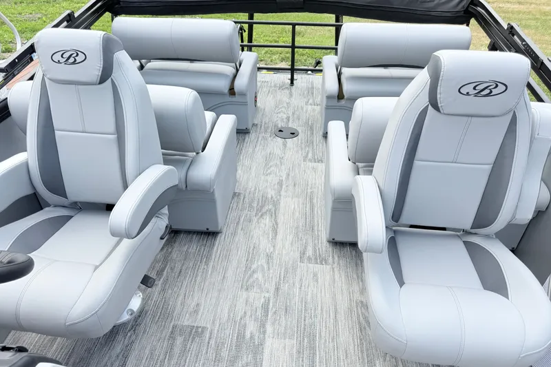 Slide: The Image of Luxurious seating on 2027 Bentley Pontoons LEGACY 220 QSB with elegant gray upholstery. - 13