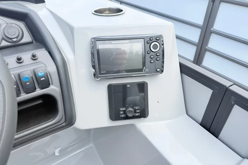Slide: The Image of Dashboard of 2027 Bentley Pontoons LEGACY 220 QSB with Humminbird and JBL controls. - 15