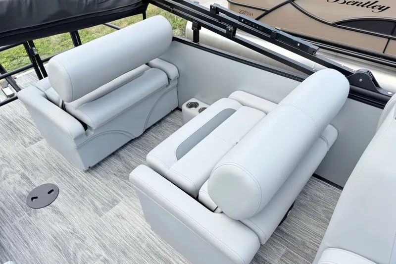 Slide: The Image of Luxurious seating on 2027 Bentley Pontoons LEGACY 220 QSB, featuring elegant gray upholstery. - 17