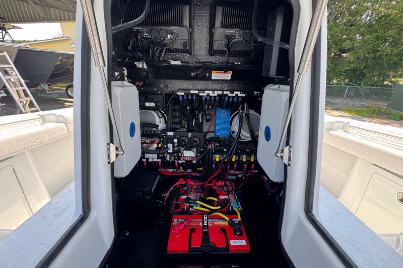 Slide: The Image of Interior view of 2027 Yellowfin 26 Hybrid boat's electrical system and components. - 25