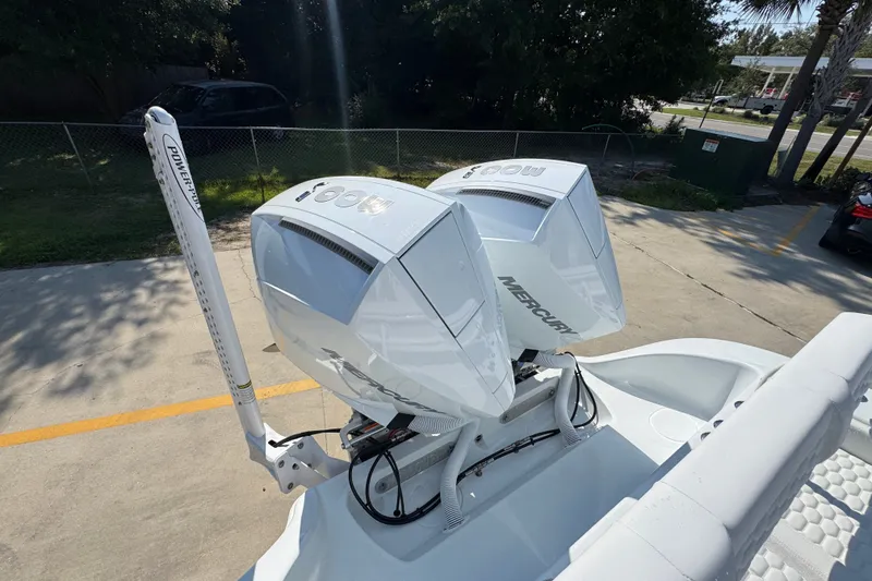 Slide: The Image of 2027 Yellowfin 26 Hybrid boat with dual Mercury outboard engines. - 43