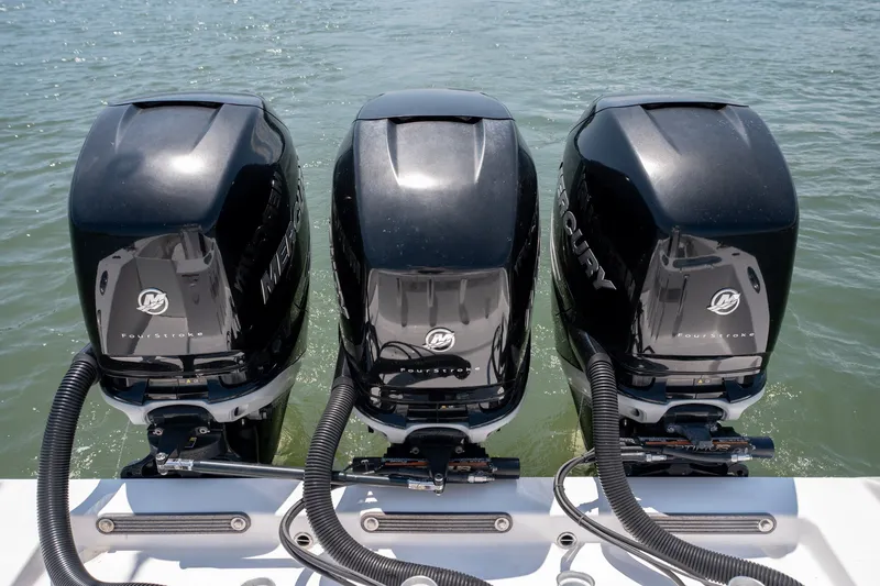 Slide: The Image of Triple Mercury outboard engines on a 2022 Sea-Lion 34 TE boat. - 41