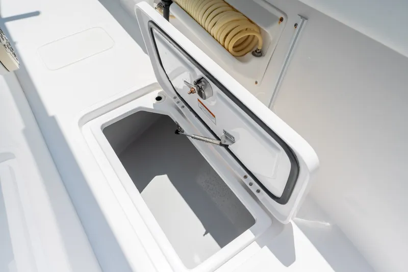 Slide: The Image of Open storage compartment on 2022 Sea-Lion 34 TE boat deck. - 23