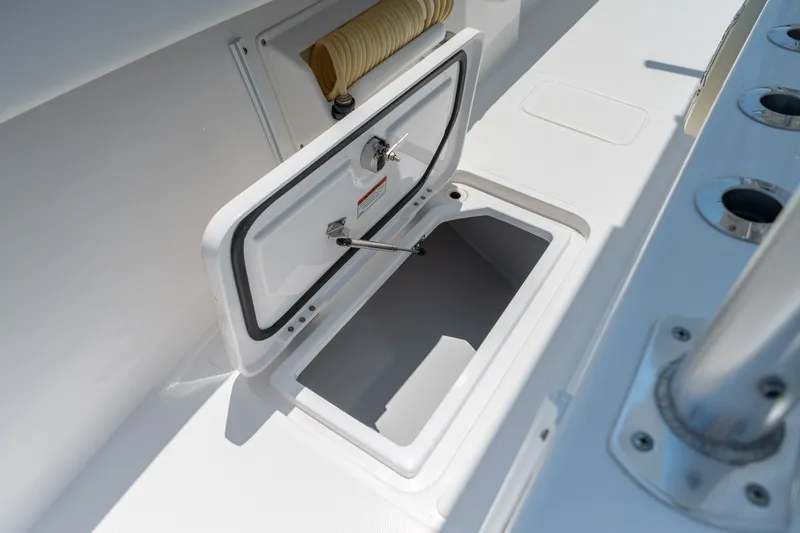 Slide: The Image of Open storage compartment on 2022 Sea-Lion 34 TE boat deck. - 22