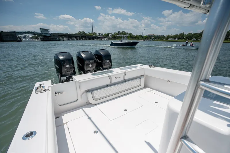 Slide: The Image of 2022 Sea-Lion 34 TE boat with triple engines on a sunny day. - 35