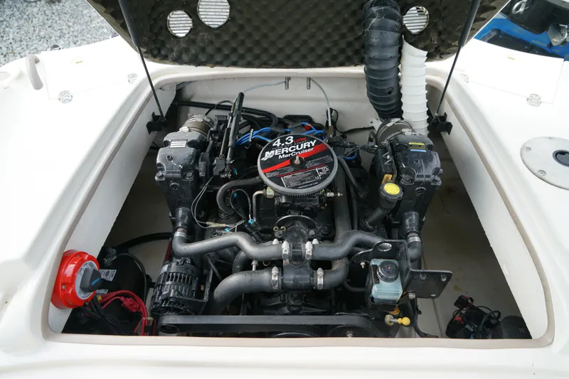 Slide: The Image of Engine compartment of a 2007 Tahoe 215 I/O boat with a 4.3L Mercury MerCruiser. - 26
