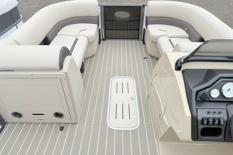Slide: The Image of Luxurious interior of 2027 Bentley Pontoons Legacy 243 Nav Ext with plush seating and modern dashboard. - 14