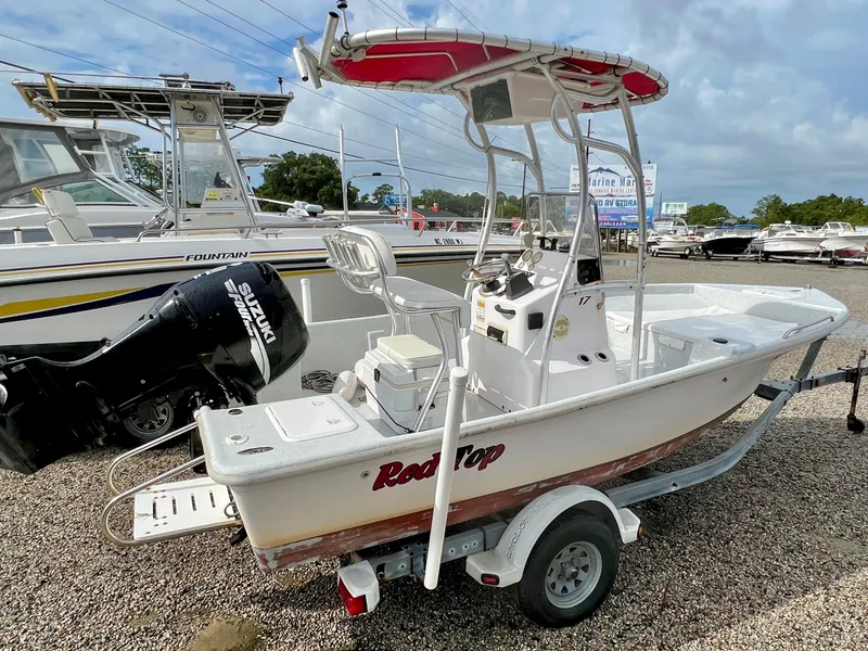 Slide: The Image of 2009 Pro-Line Pro-Lite 17 CC with T-top and outboard motor. - 6