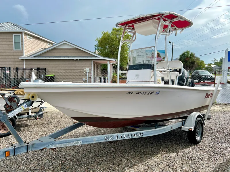 The Image of 2009 Pro-Line Pro-Lite 17 CC on a trailer, featuring a T-top and console. - 0