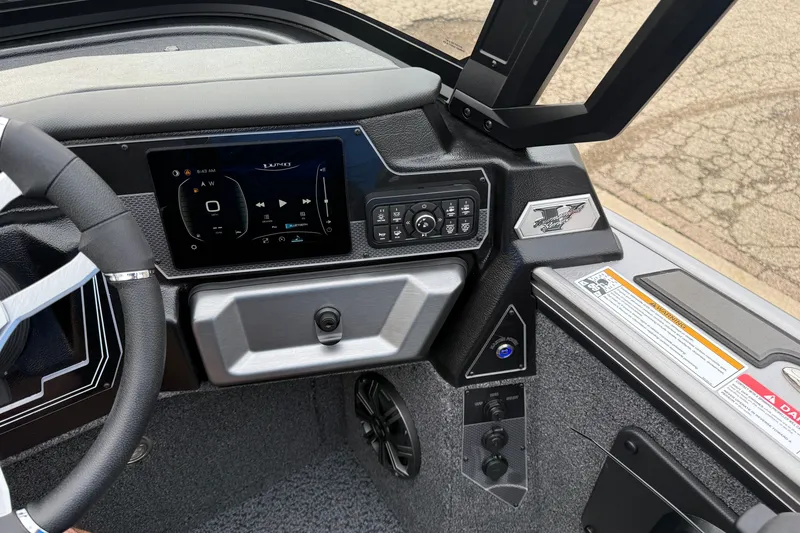 Slide: The Image of Dashboard of 2027 Lund 1975 Pro-V boat with modern controls and display. - 23