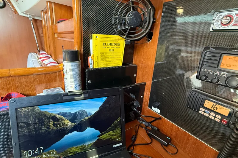 Slide: The Image of Interior of 1988 Belliure 41 yacht with navigation equipment and laptop. - 26