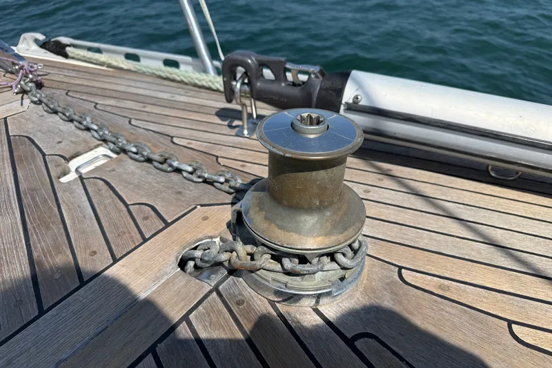 Slide: The Image of Deck of 1988 Belliure 41 yacht with anchor chain and winch. - 67