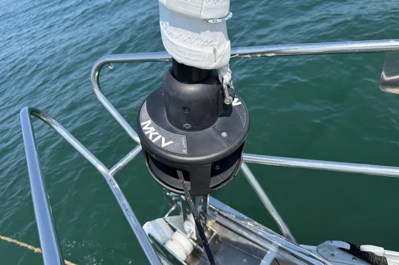 Slide: The Image of Furler mechanism on 1988 Belliure 41 sailboat, with ocean background. - 63