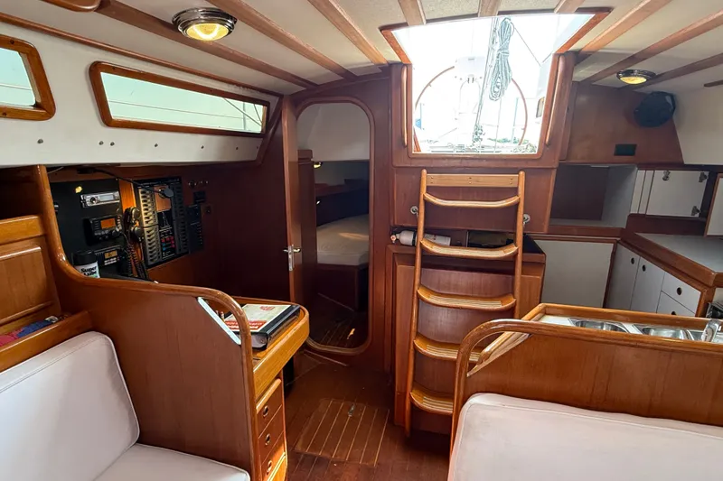 Slide: The Image of Interior of 1988 Belliure 41 yacht with wooden finishes and navigation equipment. - 16