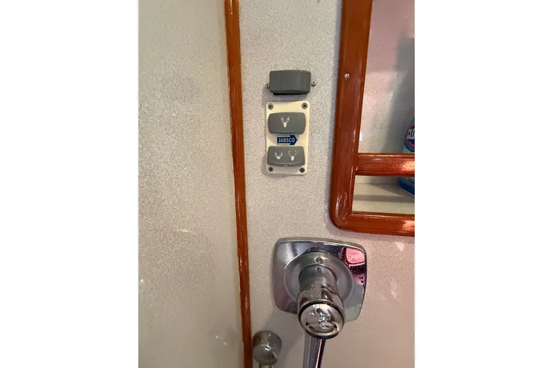 Slide: The Image of Control panel and faucet on 1988 Belliure 41 yacht interior. - 51