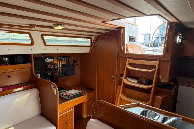 Slide: The Image of Interior of 1988 Belliure 41 yacht with wooden finish and navigation equipment. - 22