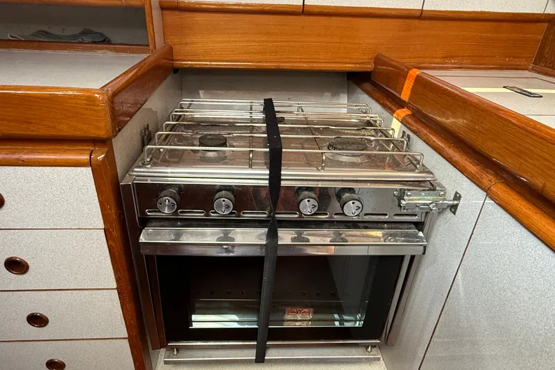 Slide: The Image of Stainless steel stove and oven in 1988 Belliure 41 yacht kitchen. - 35