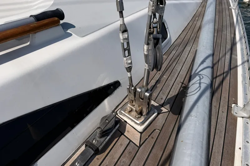 Slide: The Image of Deck of 1988 Belliure 41 sailboat with rigging and wooden details. - 61