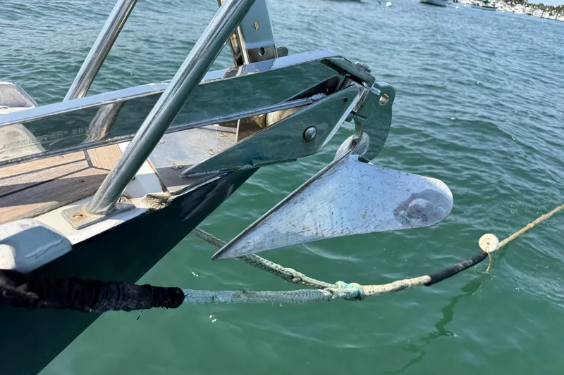 Slide: The Image of Anchor of 1988 Belliure 41 yacht in calm waters. - 64