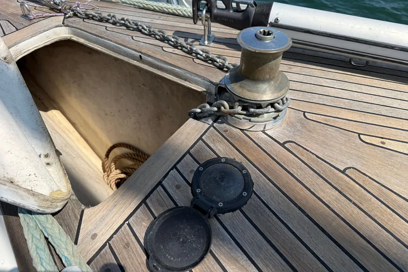Slide: The Image of Deck of 1988 Belliure 41 yacht with anchor chain and winch. - 68