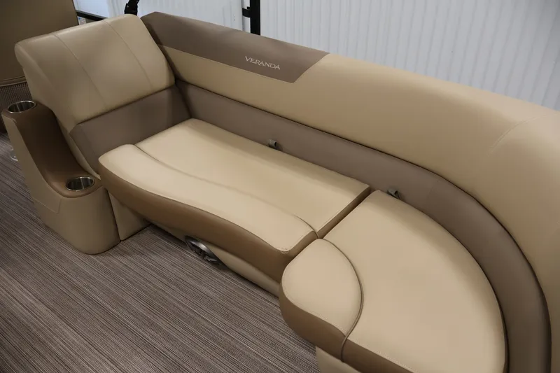 Slide: The Image of Luxurious beige seating on 2022 Veranda VR22RC boat with integrated cup holders. - 37