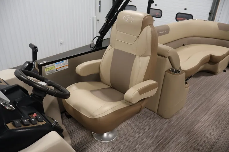 Slide: The Image of Luxurious interior of 2022 Veranda VR22RC pontoon boat with plush seating and modern controls. - 30