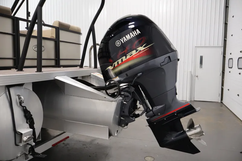 Slide: The Image of 2022 Veranda VR22RC pontoon boat with Yamaha VMAX outboard motor in a garage setting. - 42