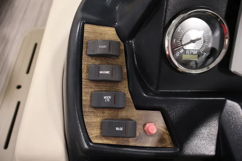 Slide: The Image of Control panel of 2022 Veranda VR22RC with switches and RPM gauge. - 23