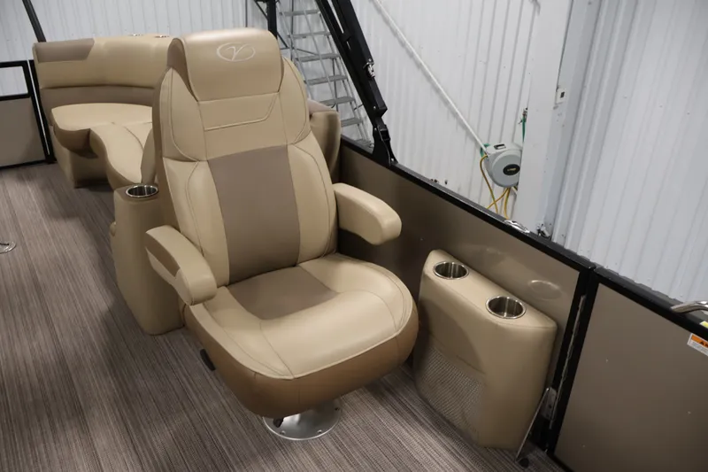 Slide: The Image of Luxurious beige seating in 2022 Veranda VR22RC pontoon boat interior. - 31