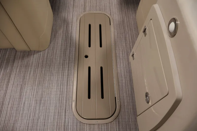 Slide: The Image of 2022 Veranda VR22RC interior with sleek flooring and storage compartment. - 32