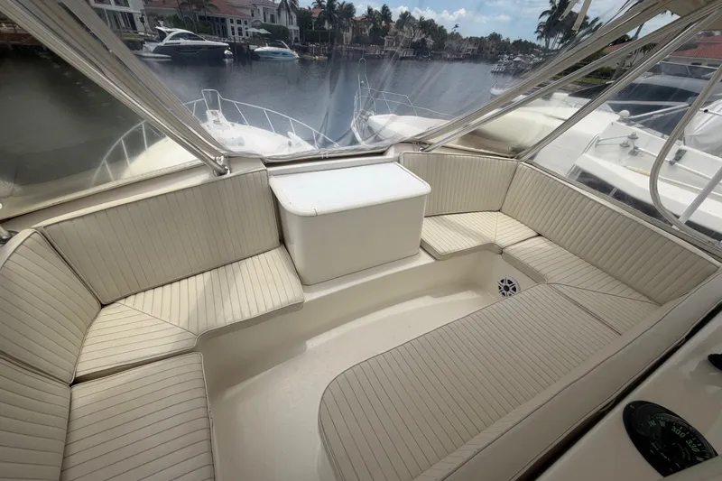 Slide: The Image of 2001 Ocean Yachts 56 Super Sport interior with spacious seating and waterfront view. - 50