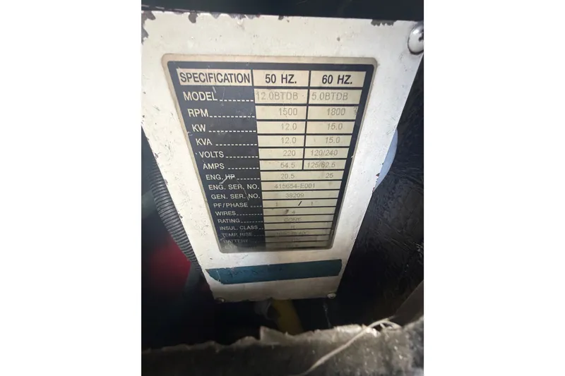 Slide: The Image of Electrical specification label on a 2001 Ocean Yachts 56 Super Sport boat. - 15