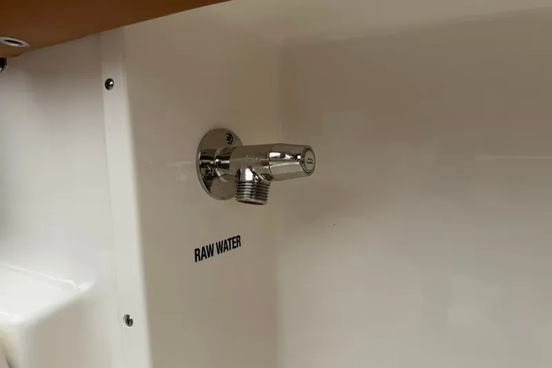 Slide: The Image of Raw water outlet on 2027 Key West 239 DFS boat interior. - 44