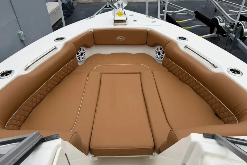 Slide: The Image of Luxurious seating area on 2027 Key West 239 DFS boat with tan upholstery. - 24