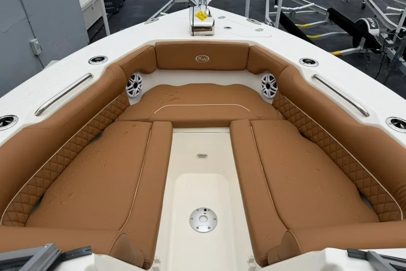 Slide: The Image of Luxurious seating area on 2027 Key West 239 DFS boat with tan upholstery. - 23