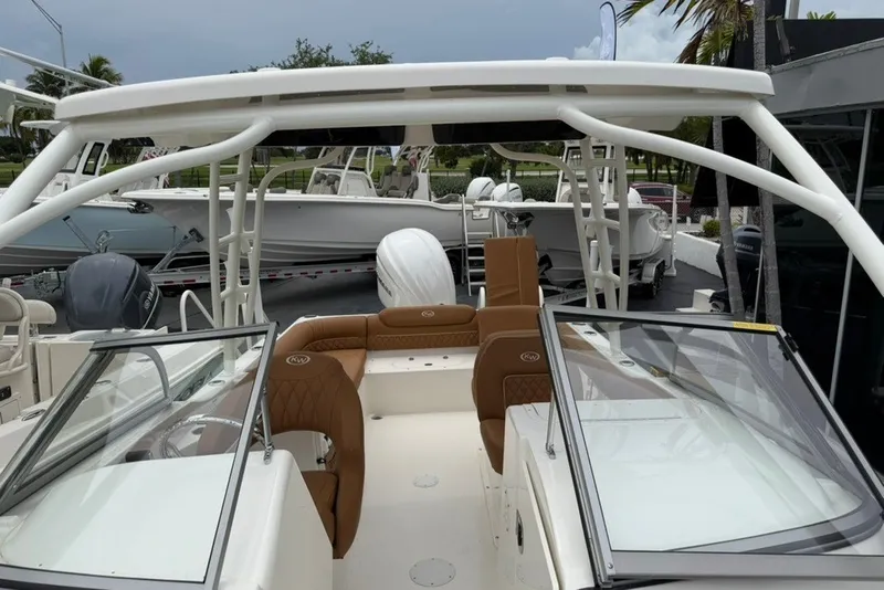 Slide: The Image of 2027 Key West 239 DFS boat with sleek design and comfortable seating. - 8