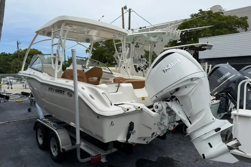 Slide: The Image of 2027 Key West 239 DFS boat with Yamaha outboard motor on a trailer. - 5