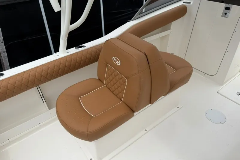 Slide: The Image of 2027 Key West 239 DFS boat seat with tan upholstery and diamond stitching. - 19