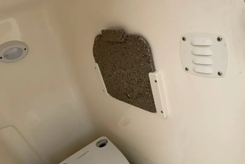 Slide: The Image of Interior of 2027 Key West 239 DFS boat, featuring a vent and wall panel. - 42