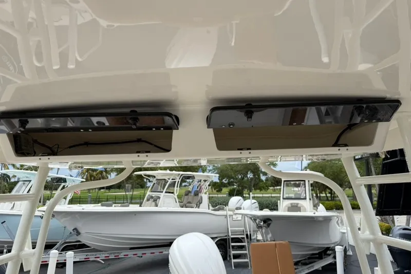 Slide: The Image of 2027 Key West 239 DFS boat interior view with overhead compartments. - 35